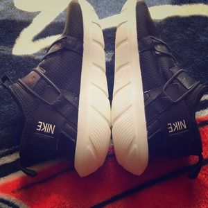 2 pairs of men’s Nike shoes size 8.5 and size 9.5